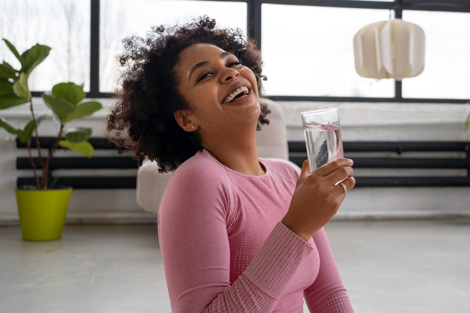  Image-of-a-lady-staying-hydrated-while-exercising